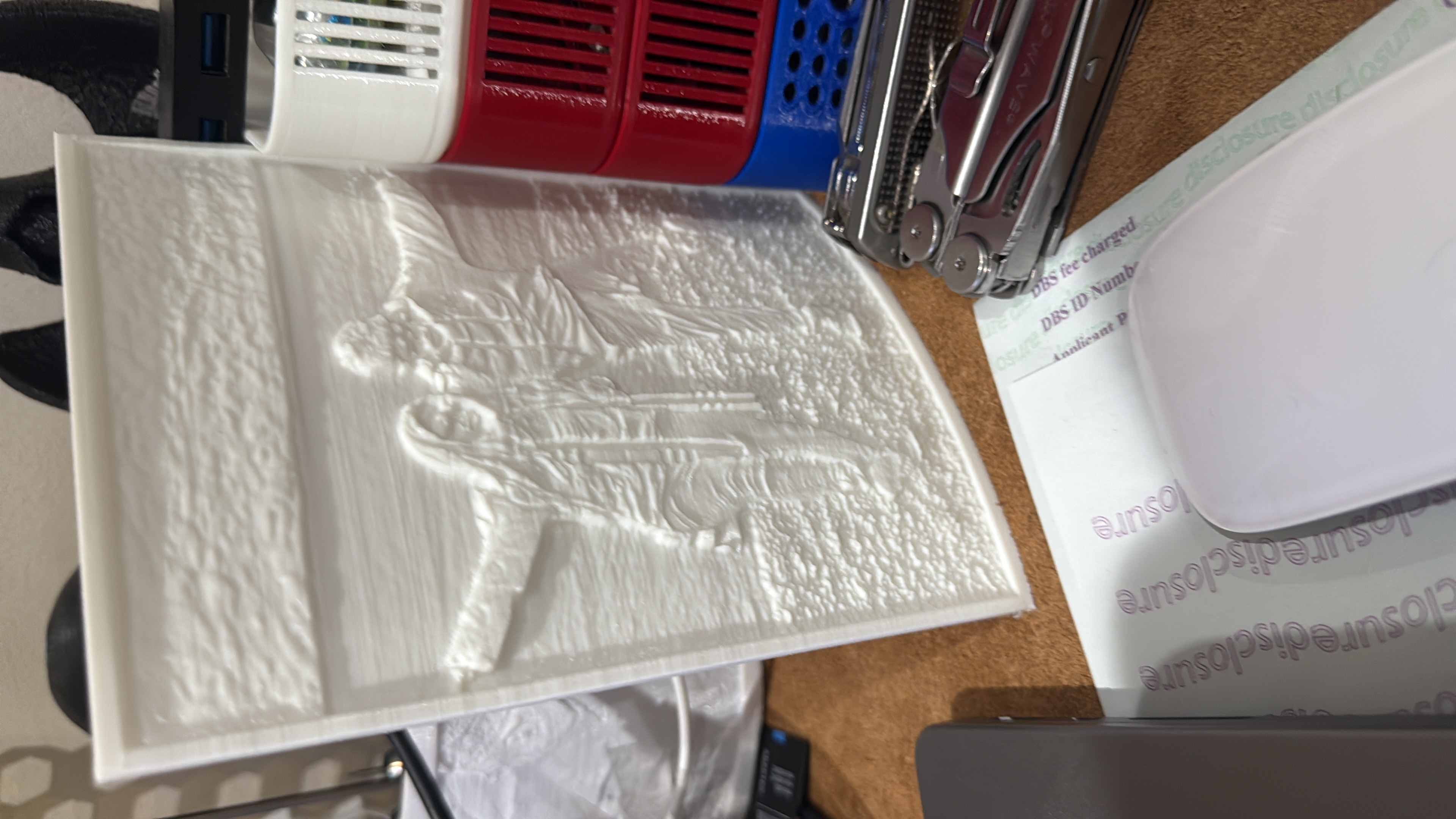 Lithophane panel showing family photo when lit